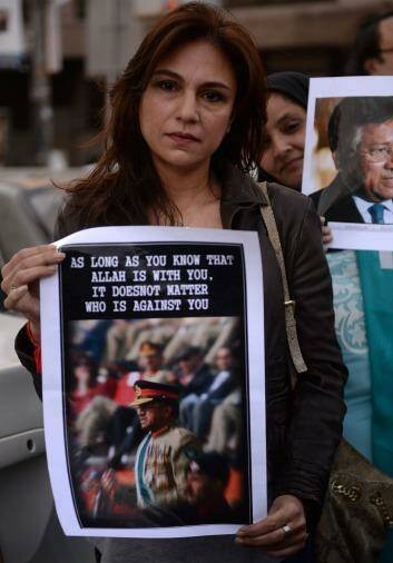 A supporter of former dictator Pervez Musharraf at a rally in Karachi on Saturday. Photo: AFP