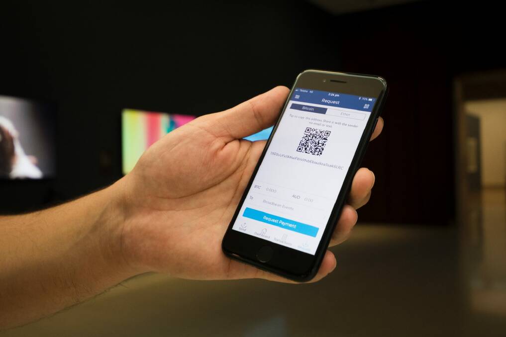 Couples can now pay for their weddings using bitcoin with the simple scan of a QR code on their phones. Photo: Dion Georgopoulos