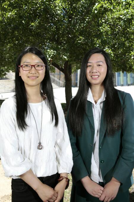 Canberra College year 12 student Jiheng Xu and Canberra Girls Grammar School year 12 student Vanessa Ma both received a Certificate of Excellence from the ACT Board of Senior Secondary Studies.  Photo:  Jeffrey Chan