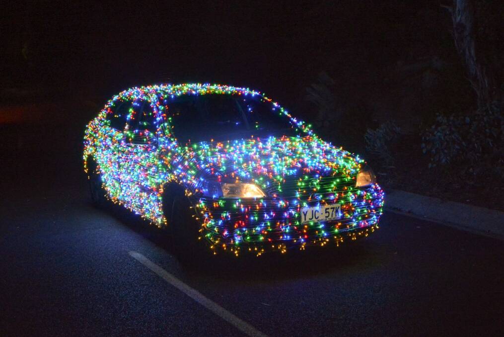 Jordan Wallace has rigged his car with 10,000 lights to spread Christmas cheer throughout Canberra Photo: Jordan Wallace