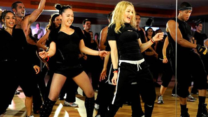 Madonna leading an "Addicted to Sweat" class at her Hard Candy Fitness centre in Mexico. Photo: madonnamexico.com