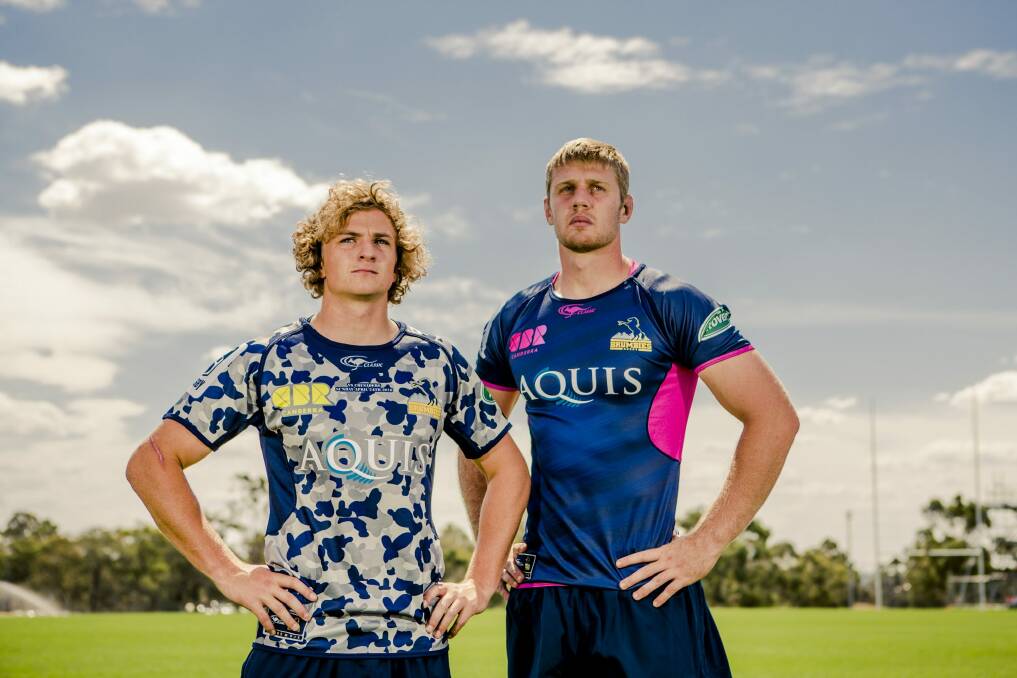Brumbies players Joe Powell, left, and Tom Staniforth in variations of this year's jersey. Photo: Jamila Toderas
