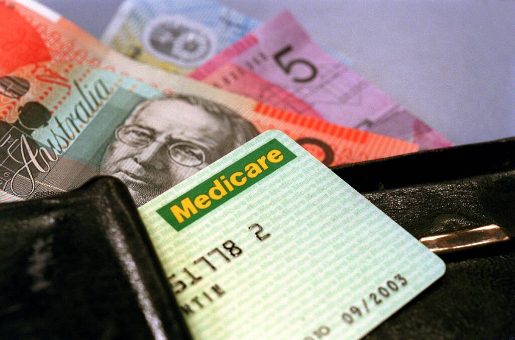 Half of Australians pay out-of-pocket fees for Medicare services out of hospital, a report shows. Photo: Fairfax Media