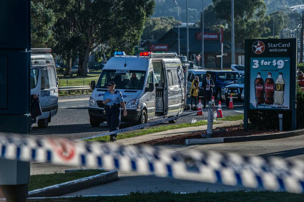Police and emergency services at the scene of the Queanbeyan service station stabbing.  Photo: Karleen Minney