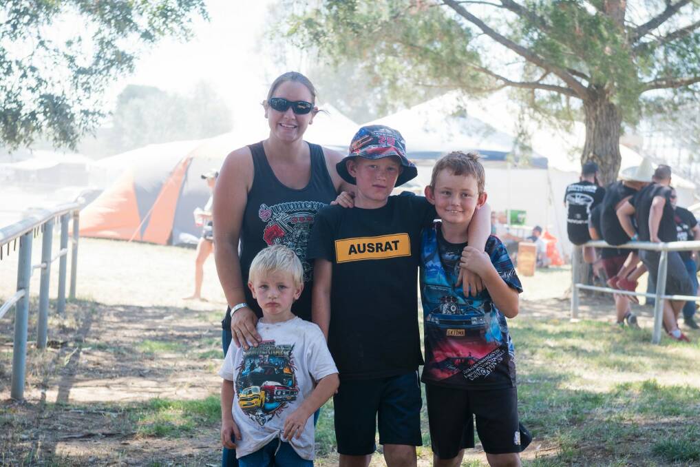 Sam Tupper with her kids, Tyler, Mitchell and Jackson. Photo: Dion Georgopoulos