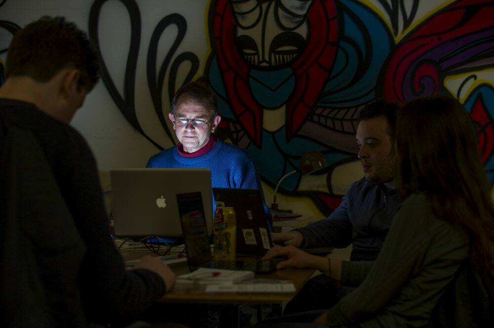 Alastair Paton works on his GovHack project at the event's Canberra site. Photo: Rohan Thomson