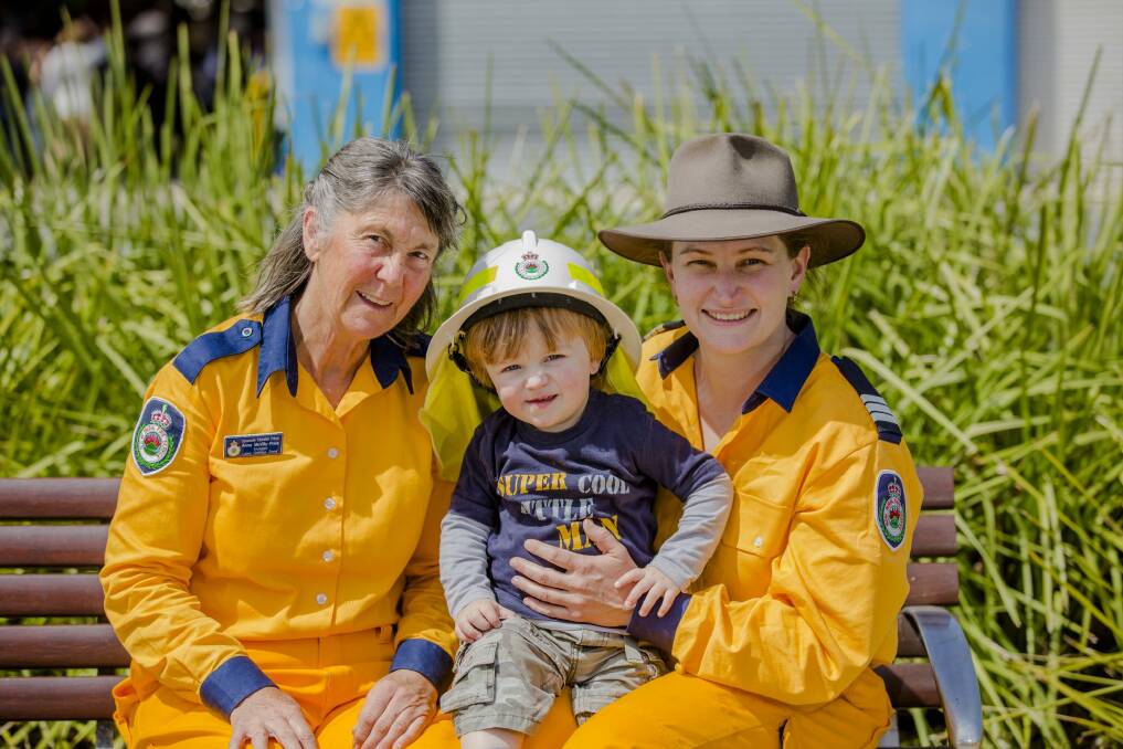 Anne McVily-Price, with grandson Aidan Price 17-months-old, and daughter-in-law Captain Kathleen Harvey enjoyed the warmer weather at the Old Bus Depot Markets on Sunday. Photo: Jamila Toderas