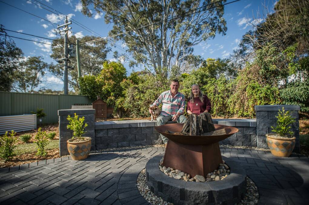 Landscaper Jason Hodges and Sharon Wood in the new backyard.  Photo: Karleen Minney