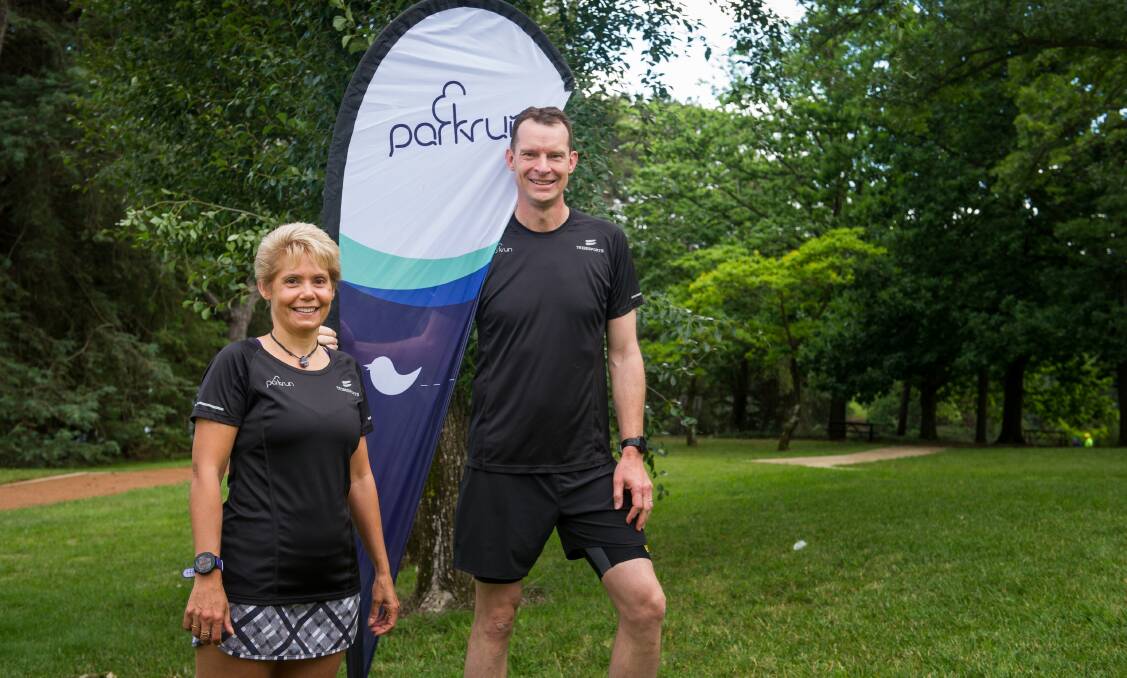 Denise Clarke, pictured with husband Gary, will be the first ACT woman to reach 250 parkruns. Photo: Elesa Kurtz