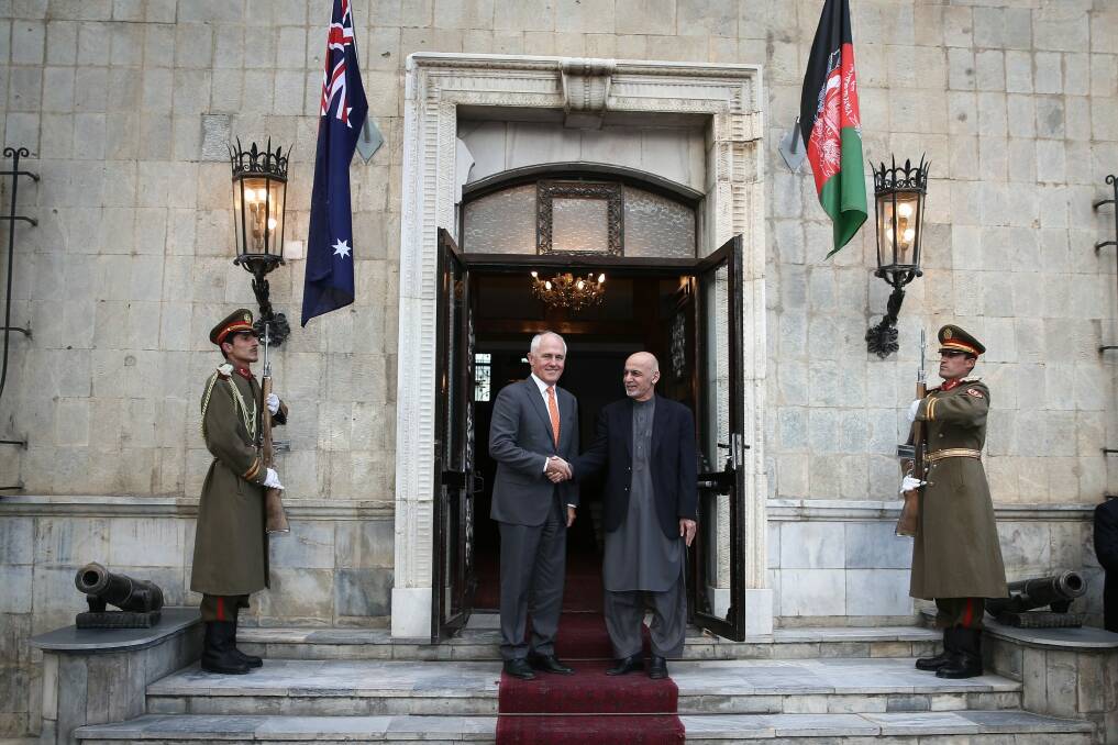 Mr Turnbull and Dr Ghani outside the palace. Photo: Alex Ellinghausen