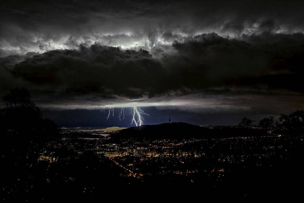 Ian Houghton's shot of an electric storm putting on a display over Canberra won him the summer photo competition. Photo: Ian Houghton 