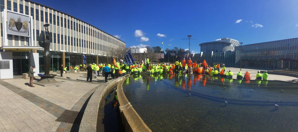 Members of ACT unions rally outside the ACT Legislative Assembly. Photo: Katie Burgess