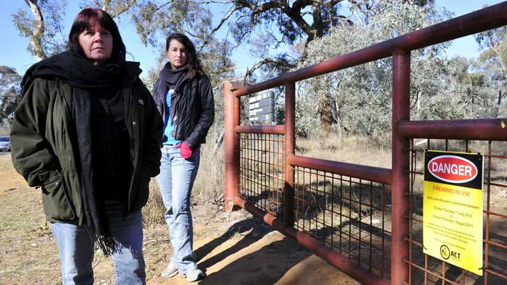 Animal Liberation spokesperson Carolyn Drew and member Jess Ferry in front of Callum Brae nature where the kangaroo cull will occur. Photo: Jay Cronan