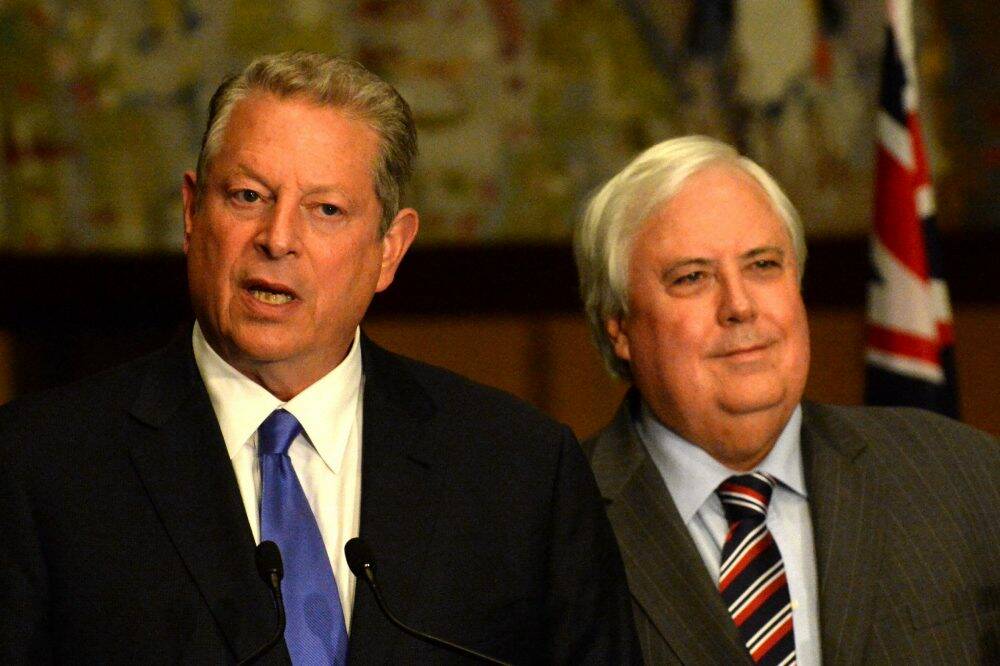 Clive Palmer, right, announces climate policy flanked by former US vice-president Al Gore. Photo: AAP
