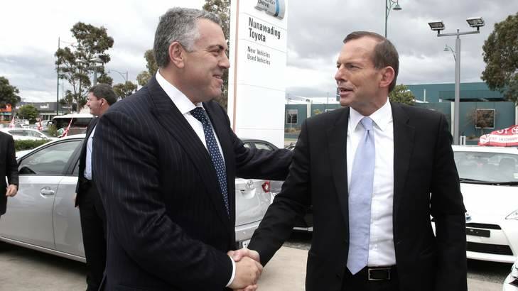 Tony Abbott and Joe Hockey visit a Victorian Toyota dealership during the 2013 election campaign. Photo: Alex Ellinghausen