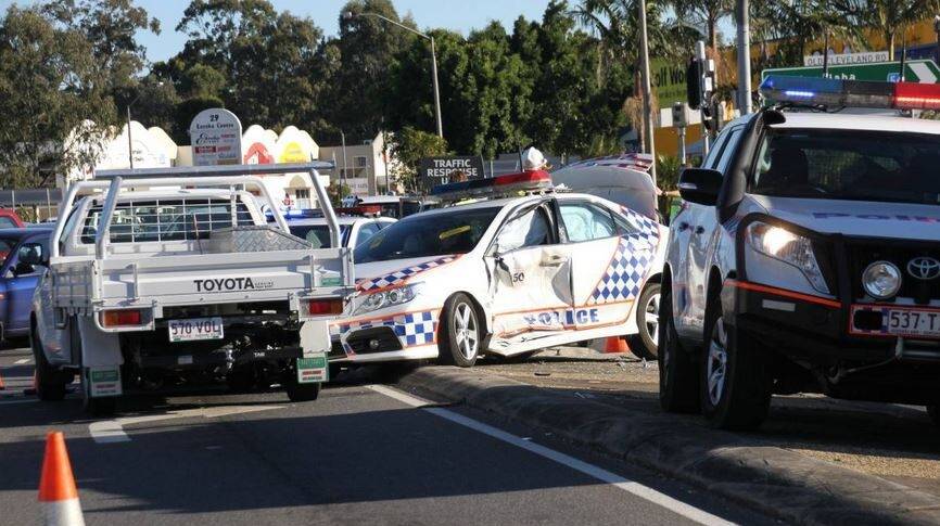 Two police officers suffered minor injuries in this crash in Capalaba. Photo: Chris McCormack