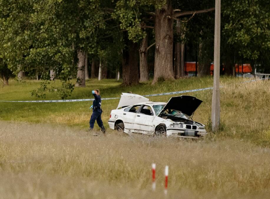 Police attend the scene the accident on Yarra Glen in Hughes. Photo: Sitthixay Ditthavong