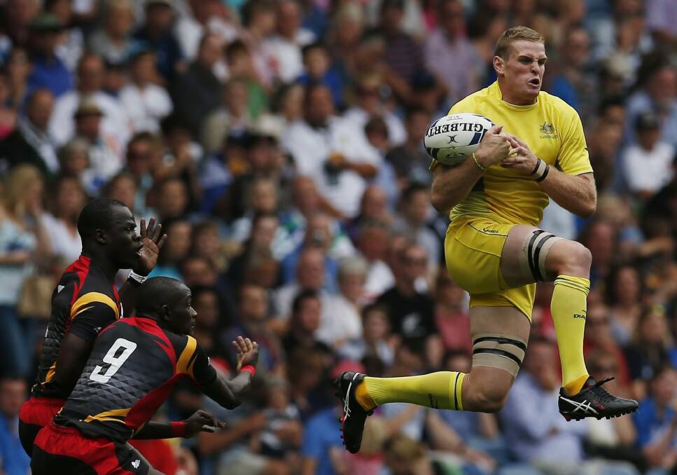 Tom Cusack playing for the Australian sevens side. Photo: Getty Images