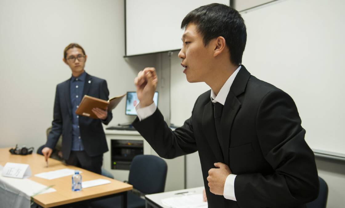 Third International Chinese Debating Competition at the Australian National University between Ian Li from Adelaide University and Jason Angsun (pictured) from ANU.
 Photo: Elesa Kurtz