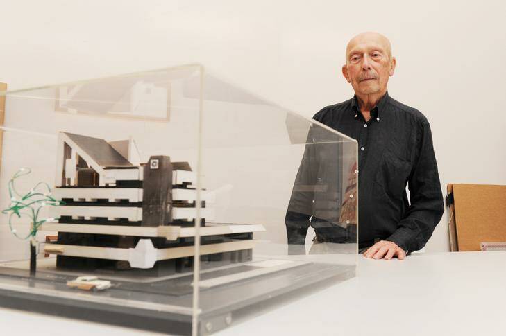 Enrico Taglietti with the model of the iconic Cinema Center that he has donated to the Canberra Museum and Gallery. Photo: Rohan Thomson