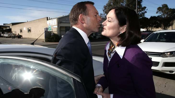 Opposition Leader Tony Abbott greets Liberal candidate Sarah Henderson. Photo: Alex Ellinghausen