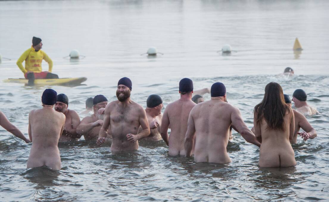 Nude swimmers brave a -3 degree morning for a charity dip in Lake Burley Griffin. Photo: Karleen Minney