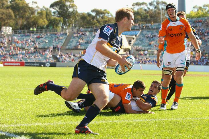 Returning Wallaby ... Pat McCabe of the Brumbies scores a try. Photo: Getty Images