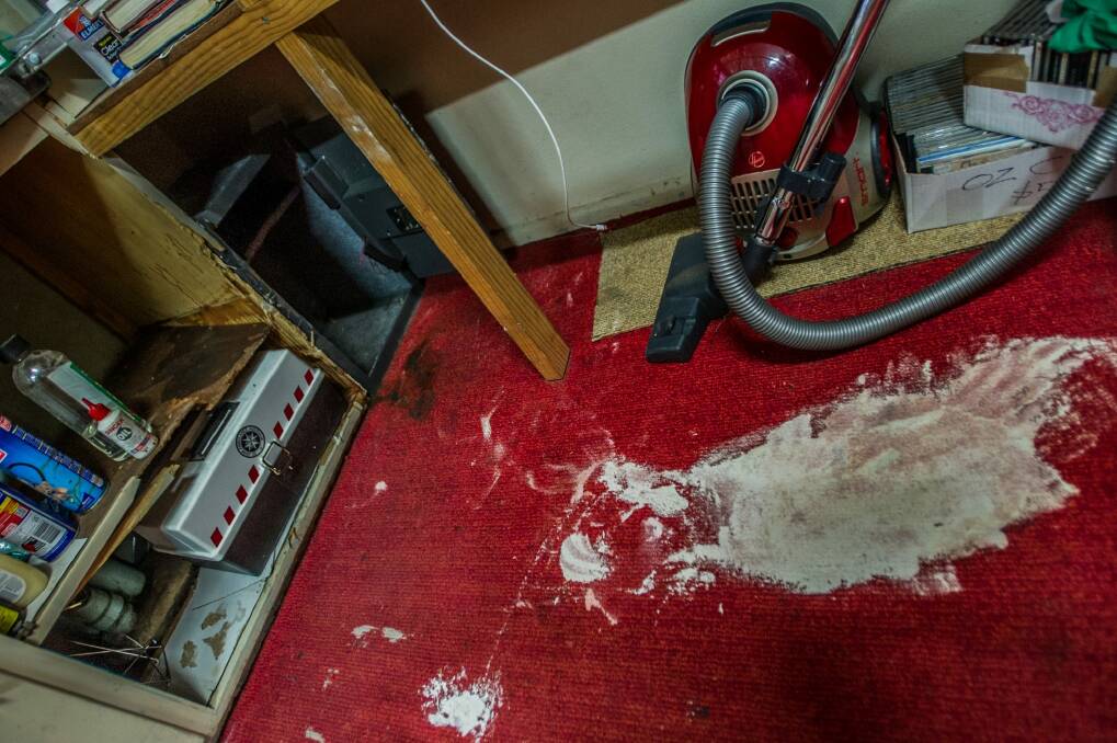 Thieves who broke into Book Lore in Lyneham early Monday morning inexplicably brought a can of paint to smear on the carpet. Photo: Karleen Minney