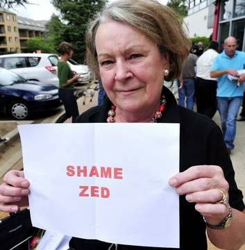 Liberal party member Diane Anderson shows her disappointment after voting was completed on Saturday. Photo: Jay Cronan