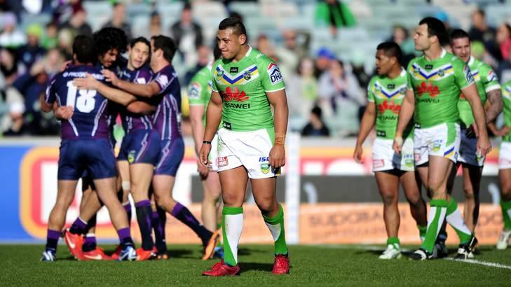 Worlds apart... The Melbourne Storm and Canberra Raiders. Photo: Melissa Adams