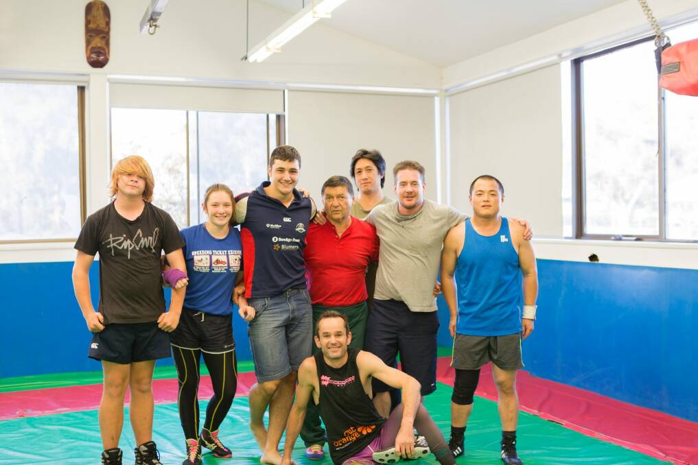 Canberra PCYC wrestling coach Witold Rejlich and athletes. The PCYC is celebrating its 60th birthday. Photo: Supplied