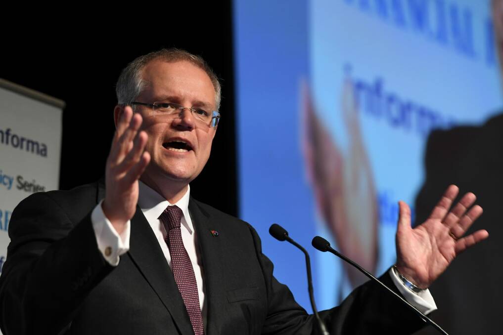 Treasurer Scott Morrison says they are making multinationals pay their "fair share". Photo: Louise Kennerley
