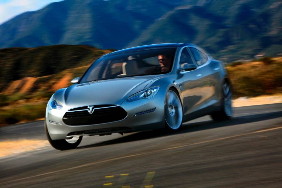 How is it fair that owners of expensive electric cars, such as the Tesla, end up paying far less tax than people who drive older, cheaper cars? Photo: Supplied