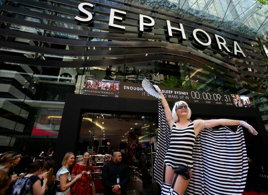 No expense spared: Crowds who had lined up for more than six hours were treated to catering and entertainment ahead of Sephora's grand opening. Photo: Dallas Kilponen