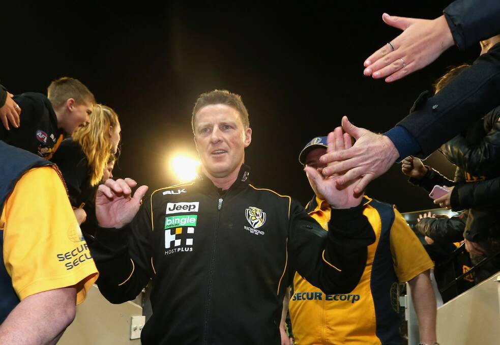 Damien Hardwick high fives fans after his side's win. Photo: Getty Images