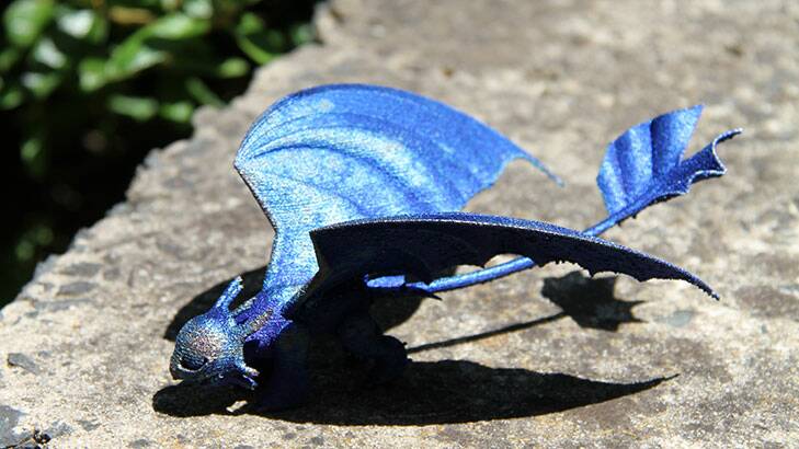 CSIRO in Melbourne has created Sophie her very own titanium dragon, modelled after Toothless from the Dreamworks movie How to Train Your Dragon. Photo: CSIRO