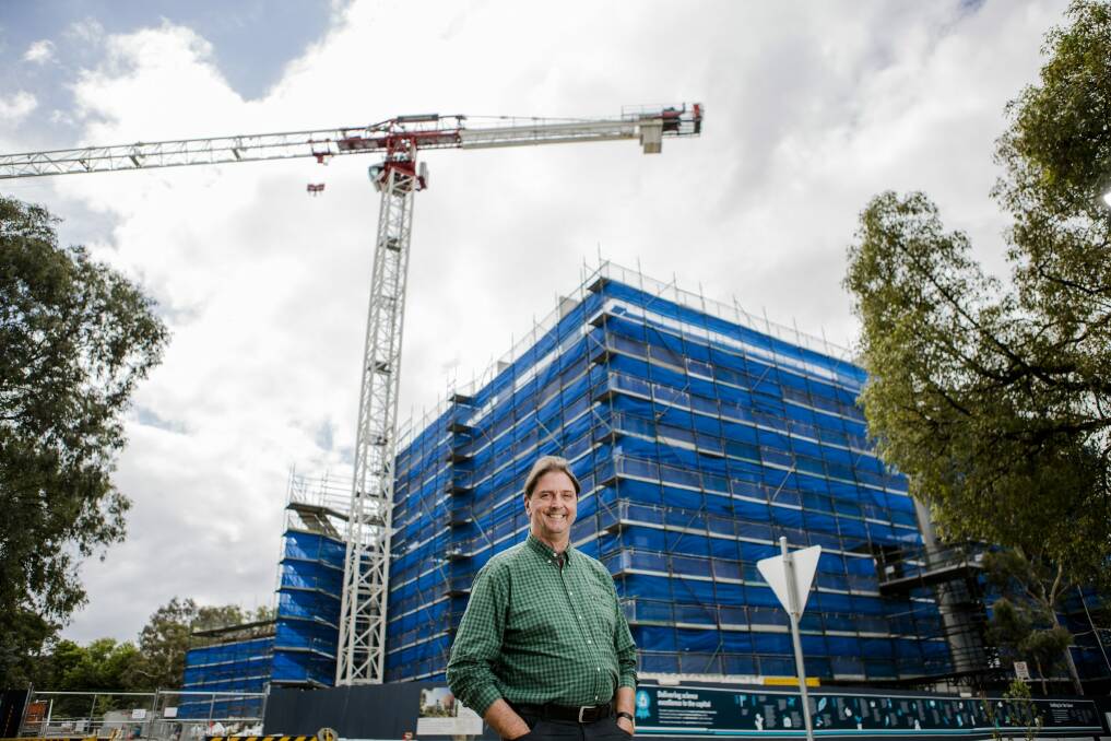 Dr John Manners, director of CSIRO Agriculture, in front of a new development site at the CSIRO Canberra. Photo: Jamila Toderas