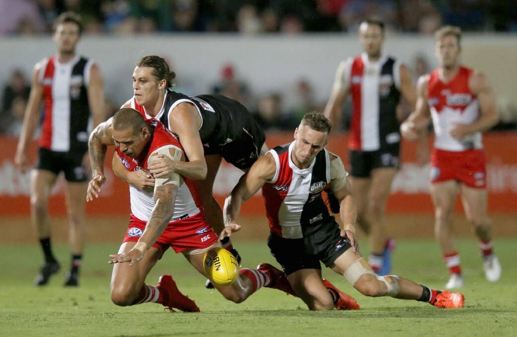 Jack Steele of the Saints tackles Lance Franklin. Photo: Getty Images
