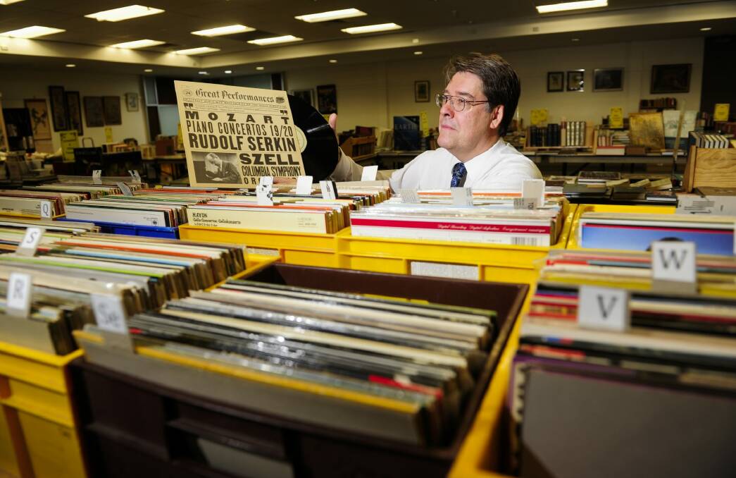 Martyn Hoffmann of Fraser with his dad's record collection that will be sold at the Lifeline book fair at EPIC in Mitchell. Photo: Melissa Adams