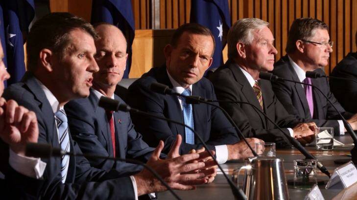 Consensus? Prime Minister Tony Abbott with state premiers and chief ministers at COAG in May. Photo: Andrew Meares