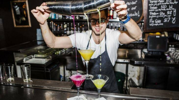 Knightsbridge bar manager Josh Nedeljkovic in action. The penthouse bar will be soon celebrating its 10th birthday. Photo: Jamila Toderas