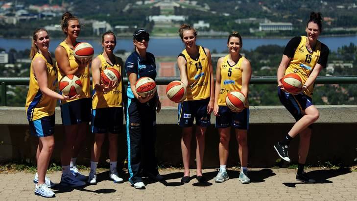 On the outer ... Lauren Jackson, right, may not play for the Canberra Capitals this season. Photo: Karleen Minney