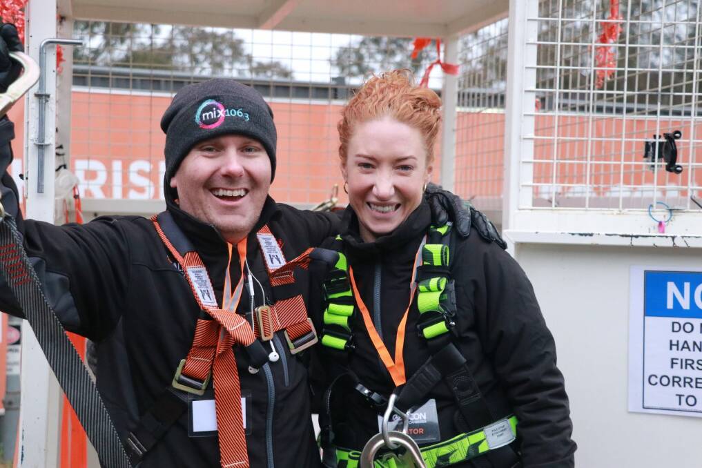 Rod Cuddihy and Kristen Henry after their epic dangle on Friday morning. Photo: Supplied