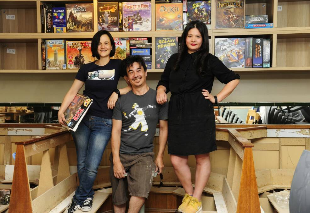 Elena Williams and Anita Nobleza, owners of Guild a board games restaurant opening in Civic, with their brother Marcello Nobleza. Photo: Melissa Adams
