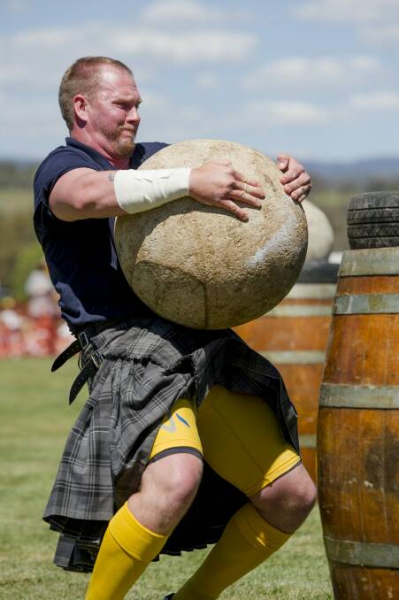 Moe Westmoreland  in the Stones of Manhood event at the Canberra Highland Gathering and Scottish Fair in Kambah.  Photo: Jay Cronan