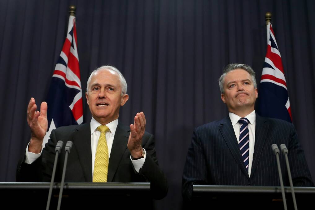 Less waiting time for businesses: Malcolm Turnbull and Mathias Cormann. Photo: Alex Ellinghausen