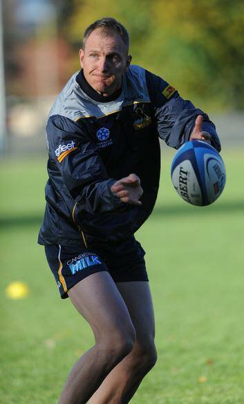 New Brumbies recruit Peter Hewat trains with the team for the first time on Sunday. Photo: Graham Tidy