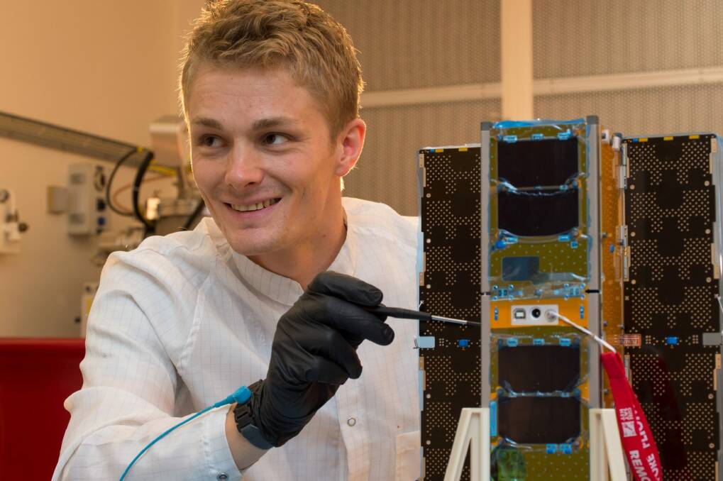 UNSW Canberra space test engineer Philippe Lorrain carries out initial acceptance tests on the BRMM (Buccaneer Risk Mitigation Mission) spacecraft bus from Pumpkin, Inc. Buccaneer CubeSat. supplied photo. 26 November 2017. Photo: John Carroll