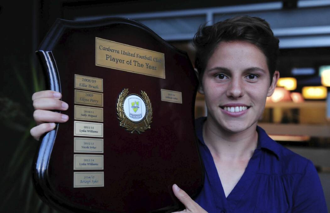 Ashleigh Sykes with the Canberra United player of the year award. Photo: Graham Tidy