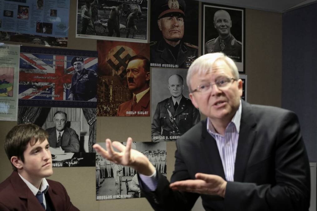 Kevin Rudd spoke to students at a school with posters of Hitler and Mussolini on the wall. Photo: Andrew Meares